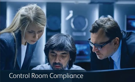 A team reviewing work on a laptop